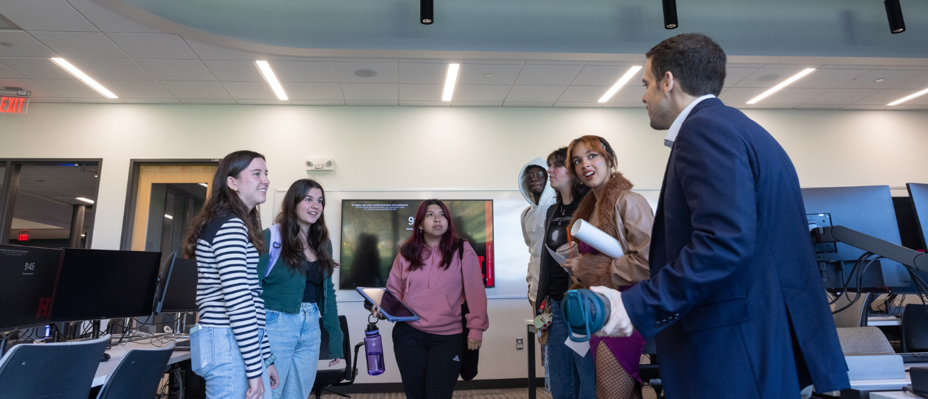 Barney students having a discussion at the trading lab